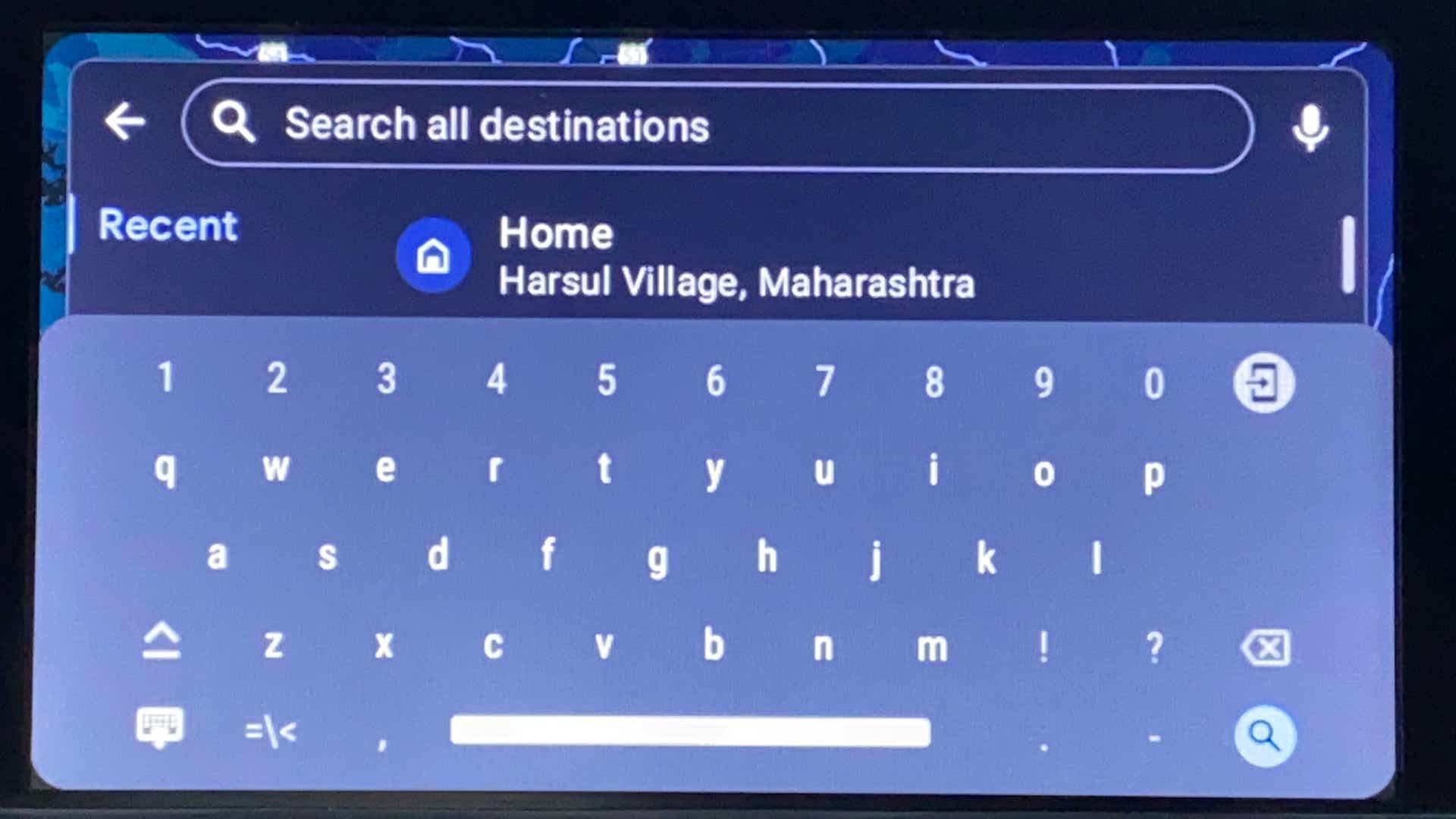 Infotainment display showing destination search screen of a Tata Nexon 2017-2023