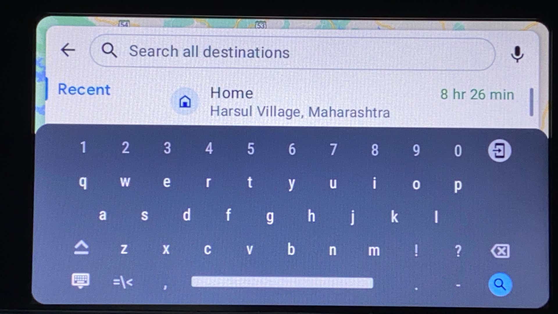 Infotainment screen showing navigation search bar and on-screen keyboard of a Tata Nexon 2017-2023