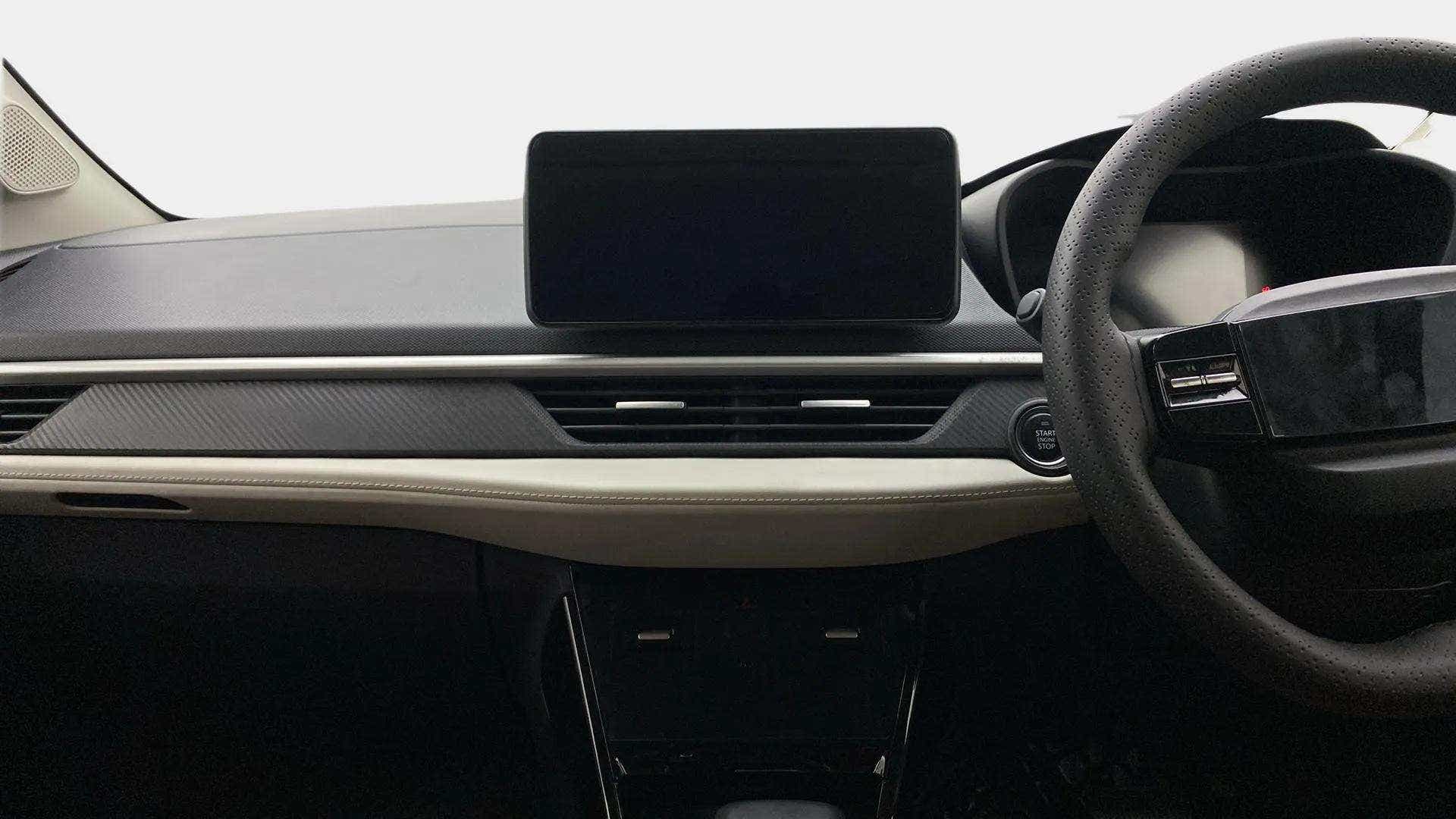 Dashboard and steering wheel view of a Tata Nexon