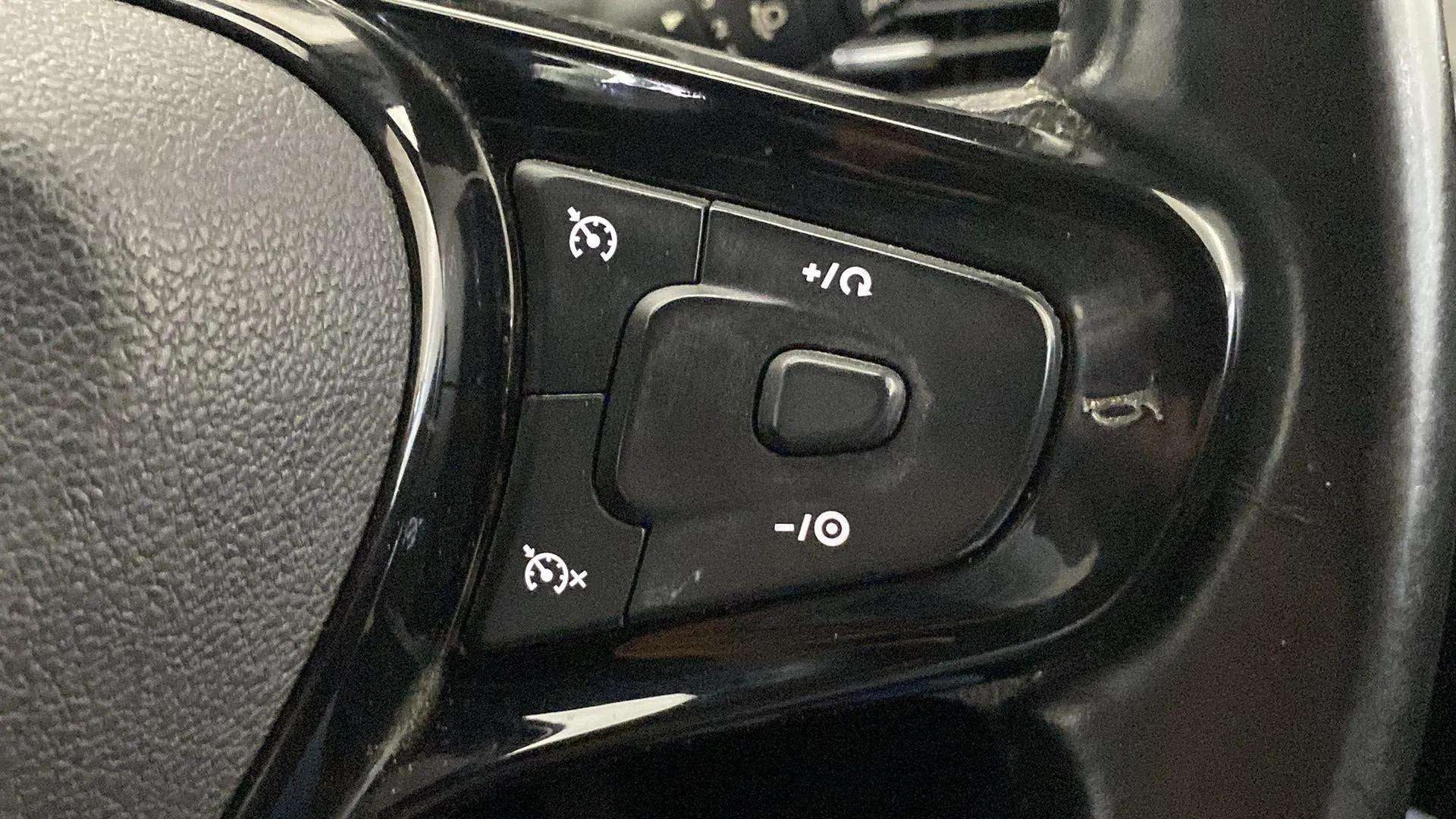Steering wheel cruise control buttons of a Tata Nexon 2017-2023