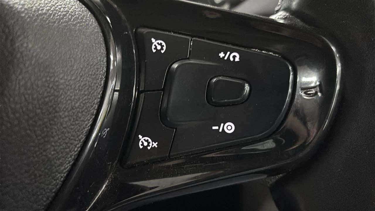 Steering wheel cruise control buttons of a Tata Nexon 2017-2023