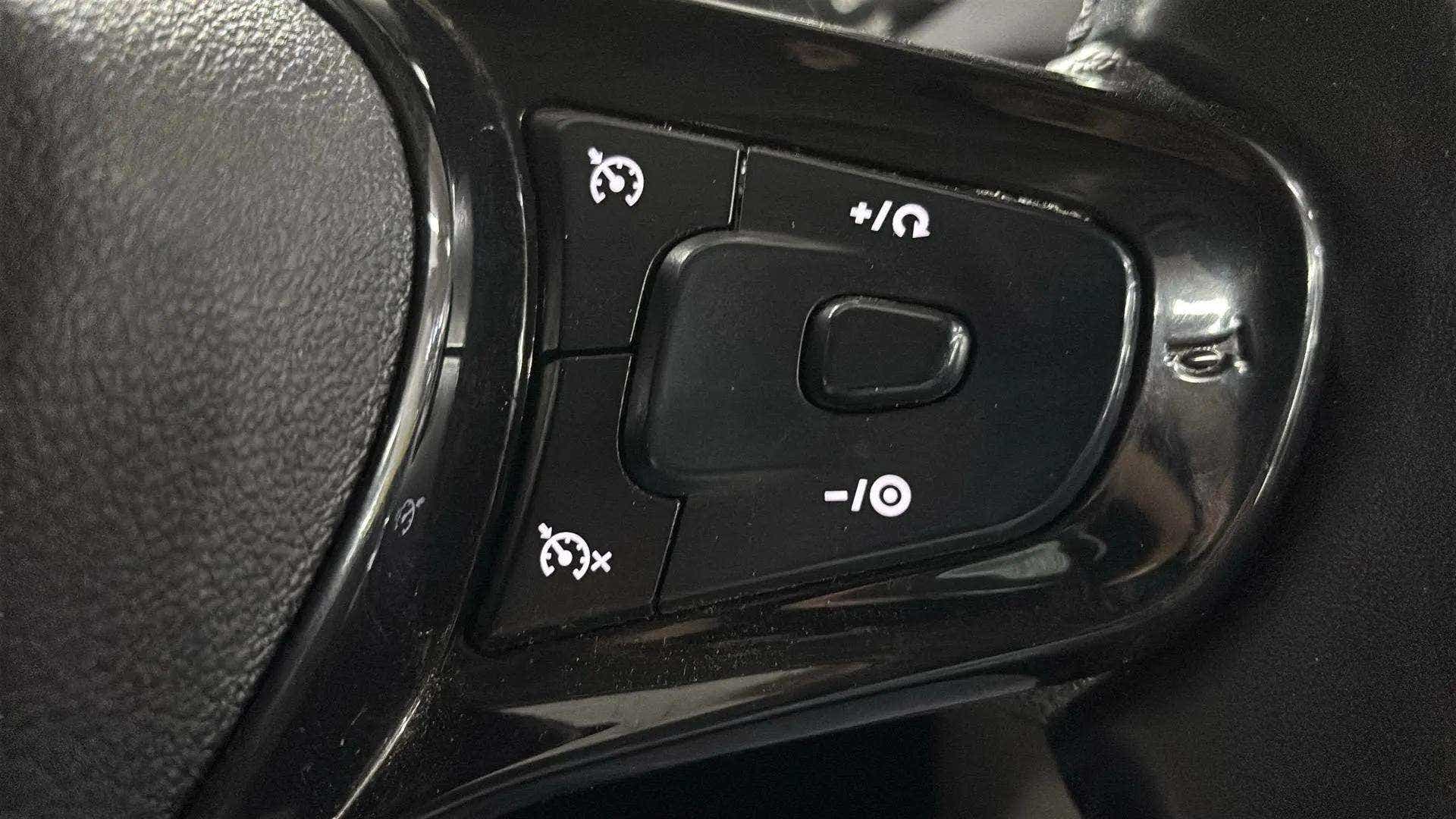 Steering wheel cruise control buttons of a Tata Nexon 2017-2023