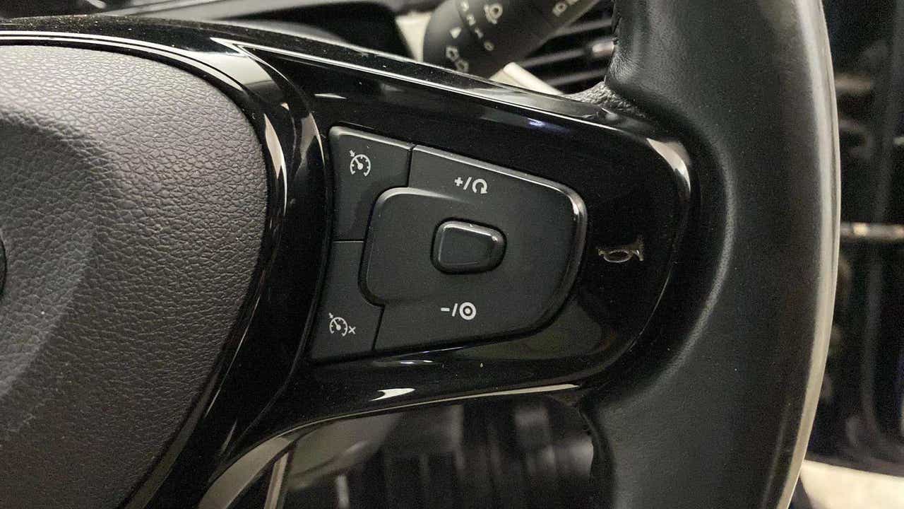 Steering wheel control close-up of a Tata Nexon 2017-2023
