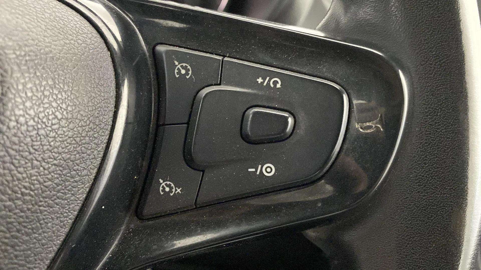 Steering wheel control close-up of a Tata Nexon 2017-2023