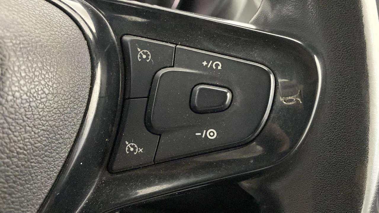 Steering wheel control close-up of a Tata Nexon 2017-2023