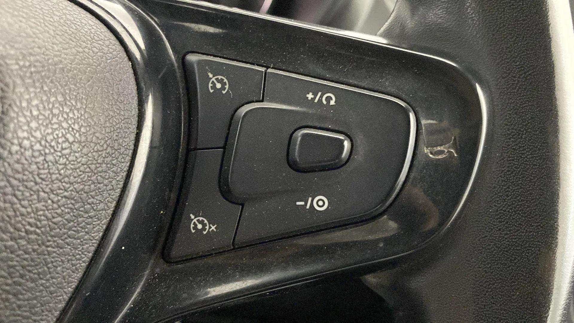Steering wheel control close-up of a Tata Nexon 2017-2023