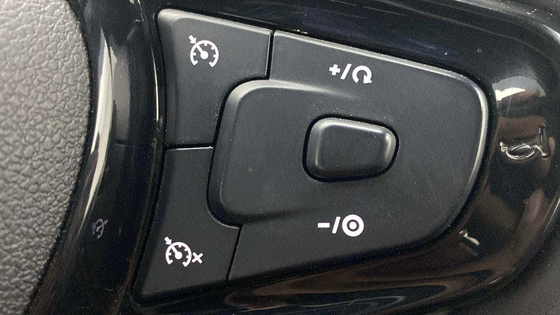 Steering wheel cruise control buttons of a Tata Nexon 2017-2023
