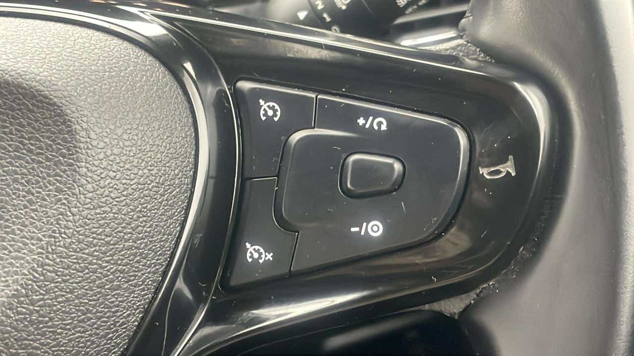 Steering wheel cruise control buttons of a Tata Nexon 2017-2023