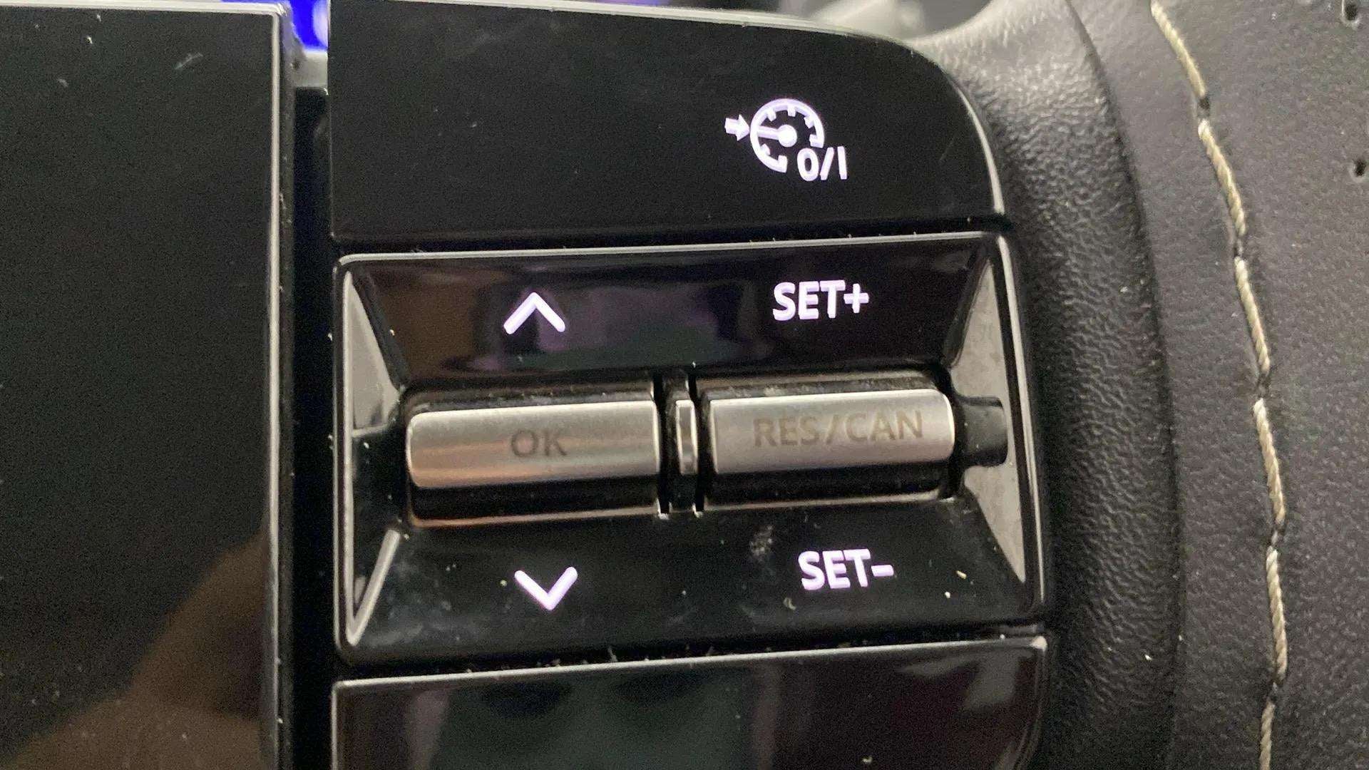 Cruise control button cluster of a Tata Nexon