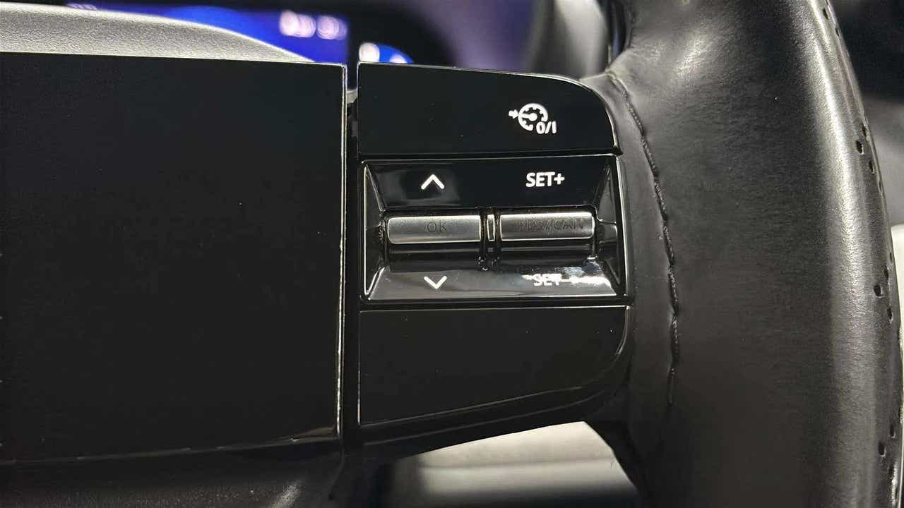 Steering wheel control buttons of a Tata Nexon