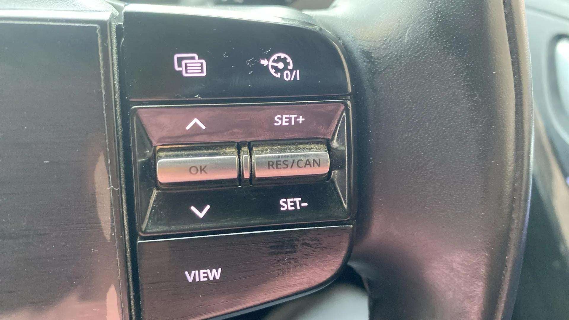 Steering wheel cruise control buttons of a Tata Nexon 2017-2023