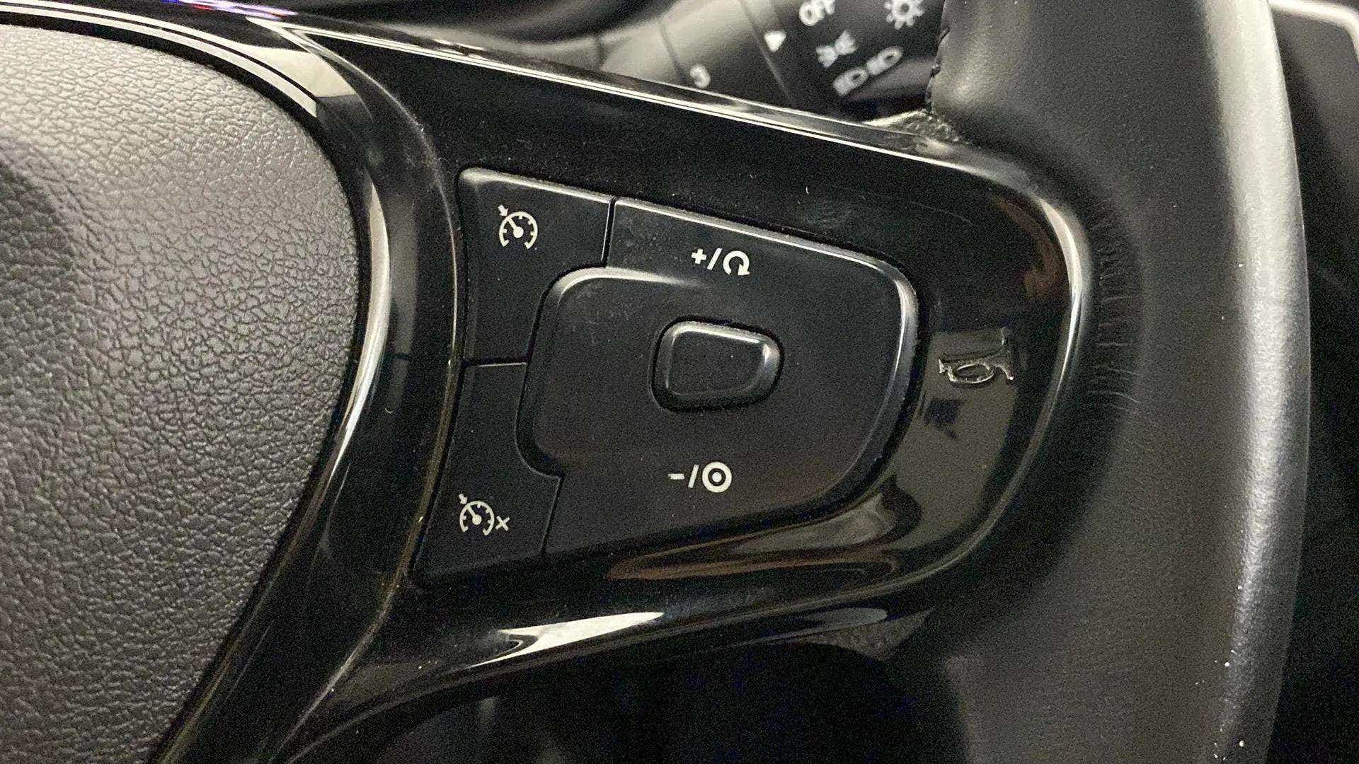 Steering wheel controls close-up of a Tata Nexon 2017-2023