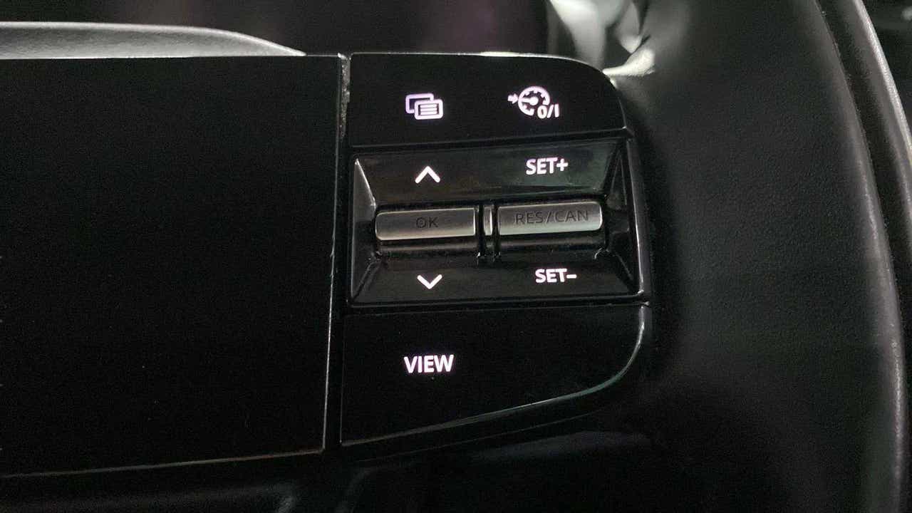 Steering wheel control buttons of a Tata Nexon