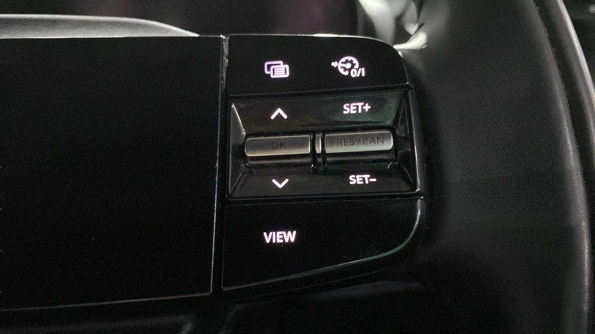 Steering wheel control buttons of a Tata Nexon