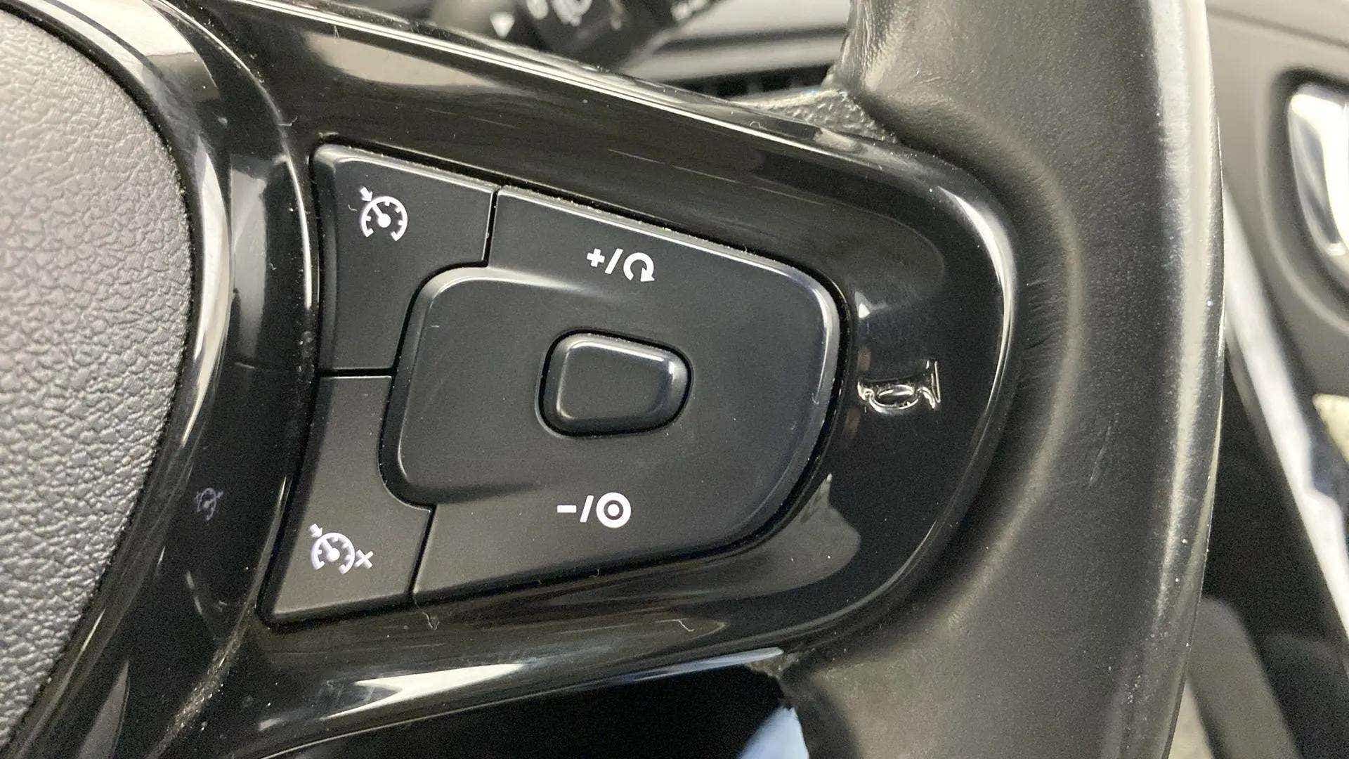 Steering wheel cruise control buttons of a Tata Nexon 2017-2023