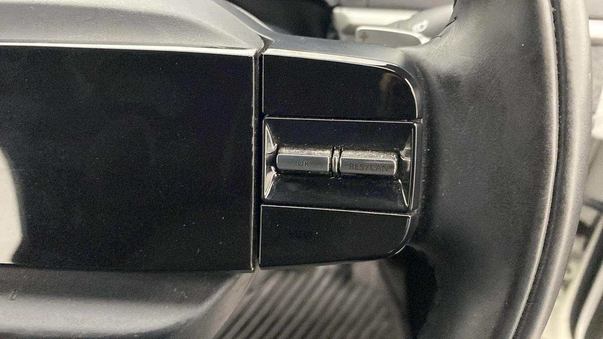 Steering wheel control buttons of a Tata Nexon