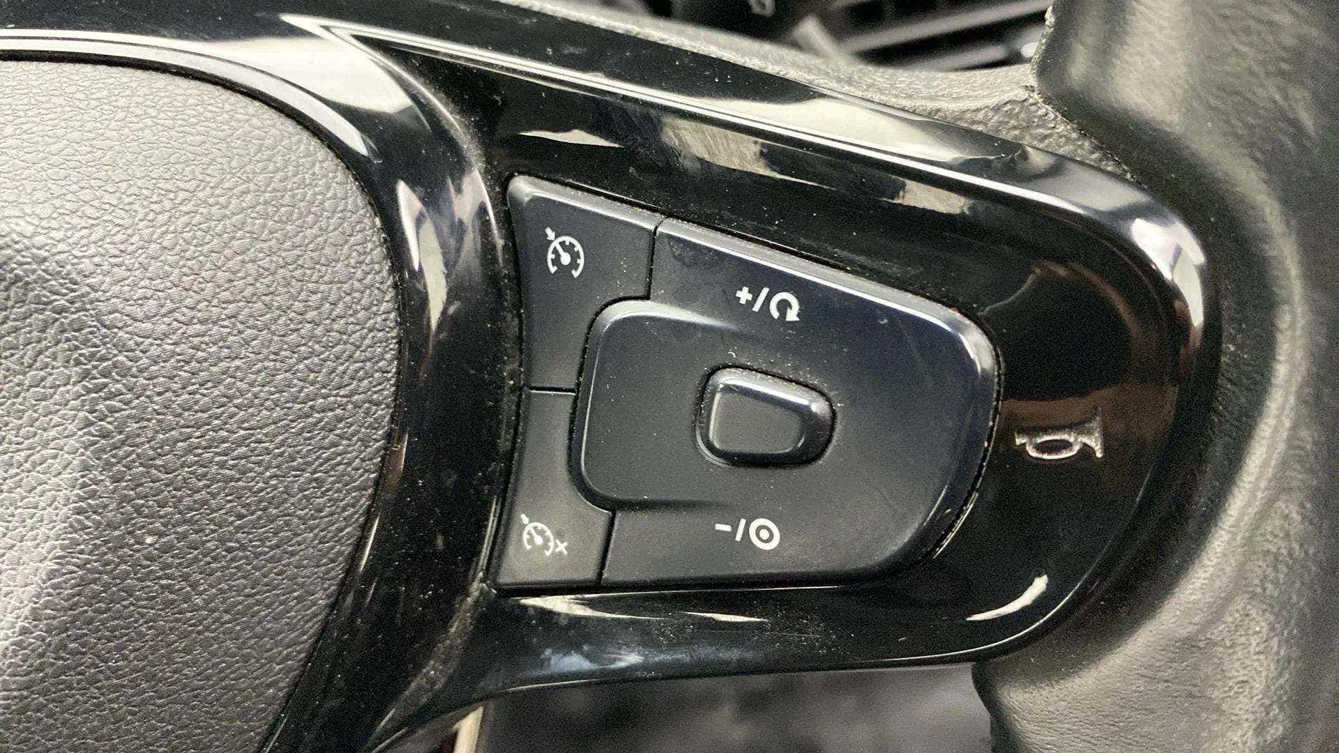 Steering wheel control buttons of a Tata Nexon 2017-2023