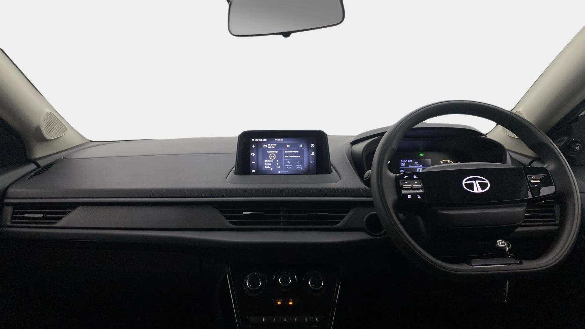 Dashboard and steering wheel view of a Tata Nexon