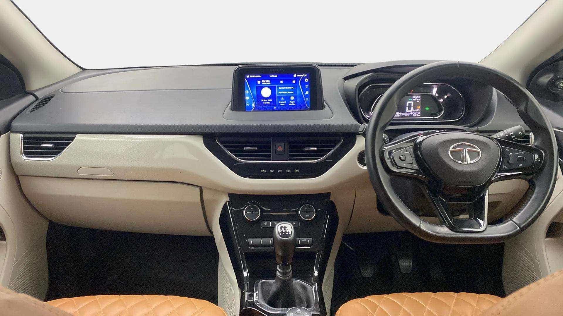 Dashboard and steering wheel of a Tata Nexon 2017-2023