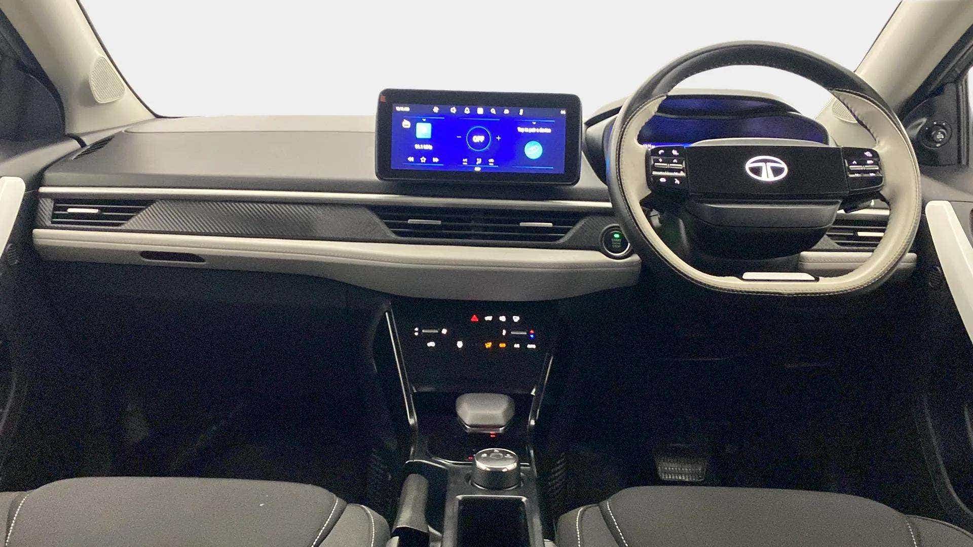 Dashboard and steering wheel view of a Tata Nexon 2017-2023