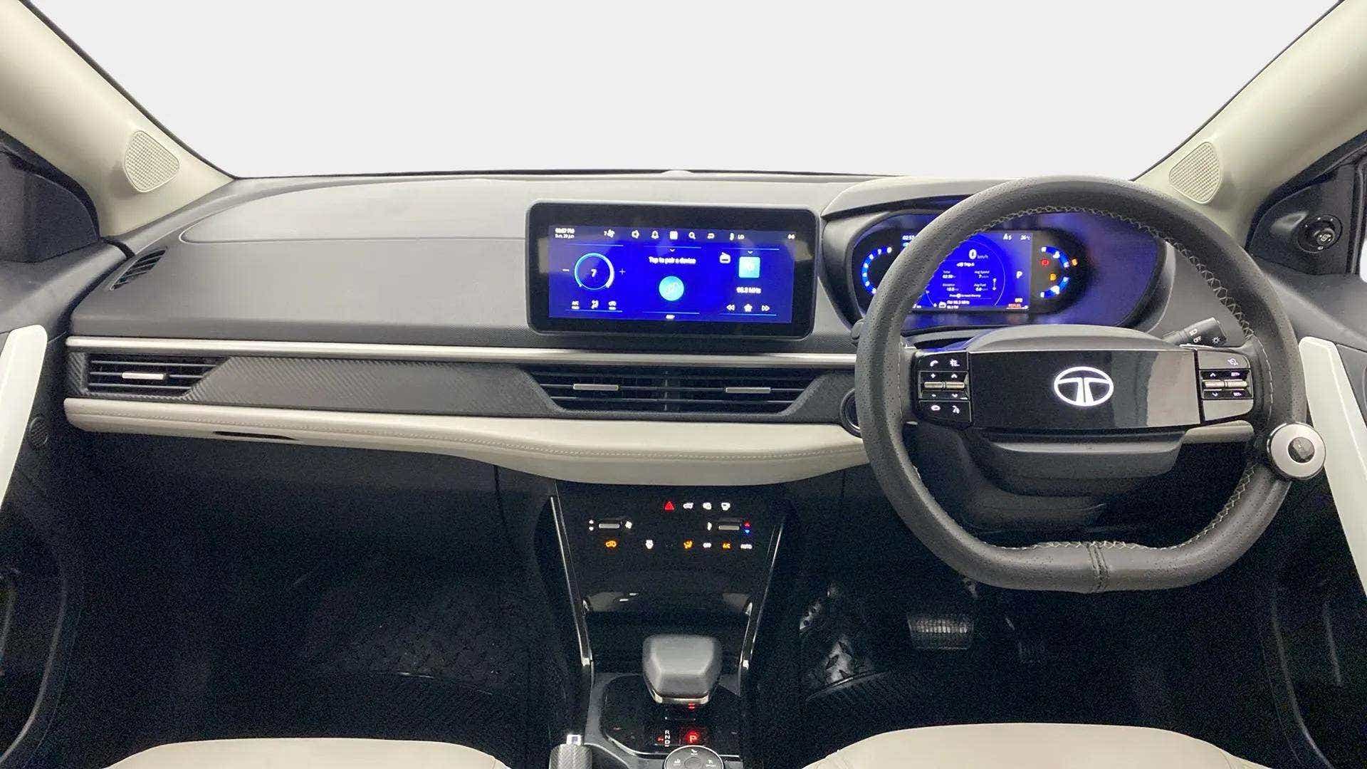 Dashboard and steering wheel view of a Tata Nexon