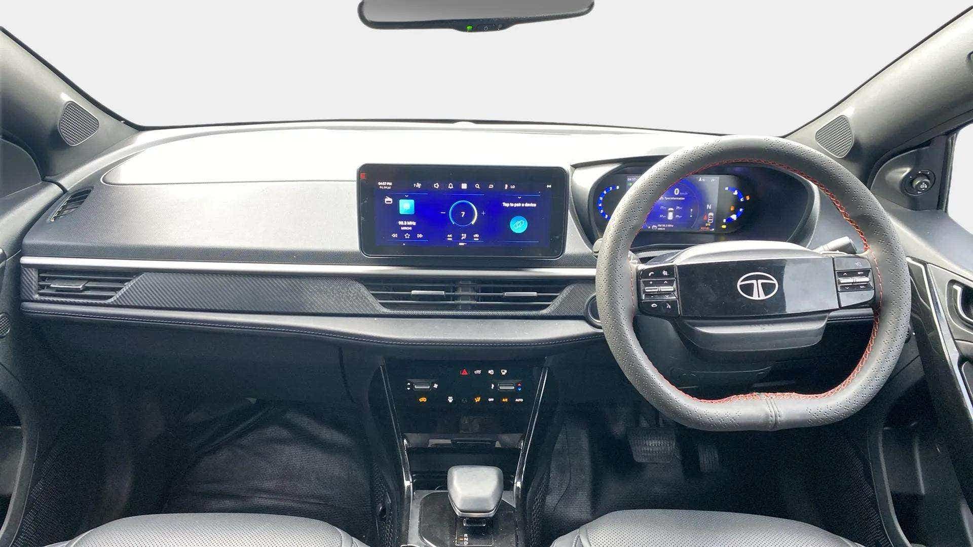 Dashboard and steering wheel of a Tata Nexon