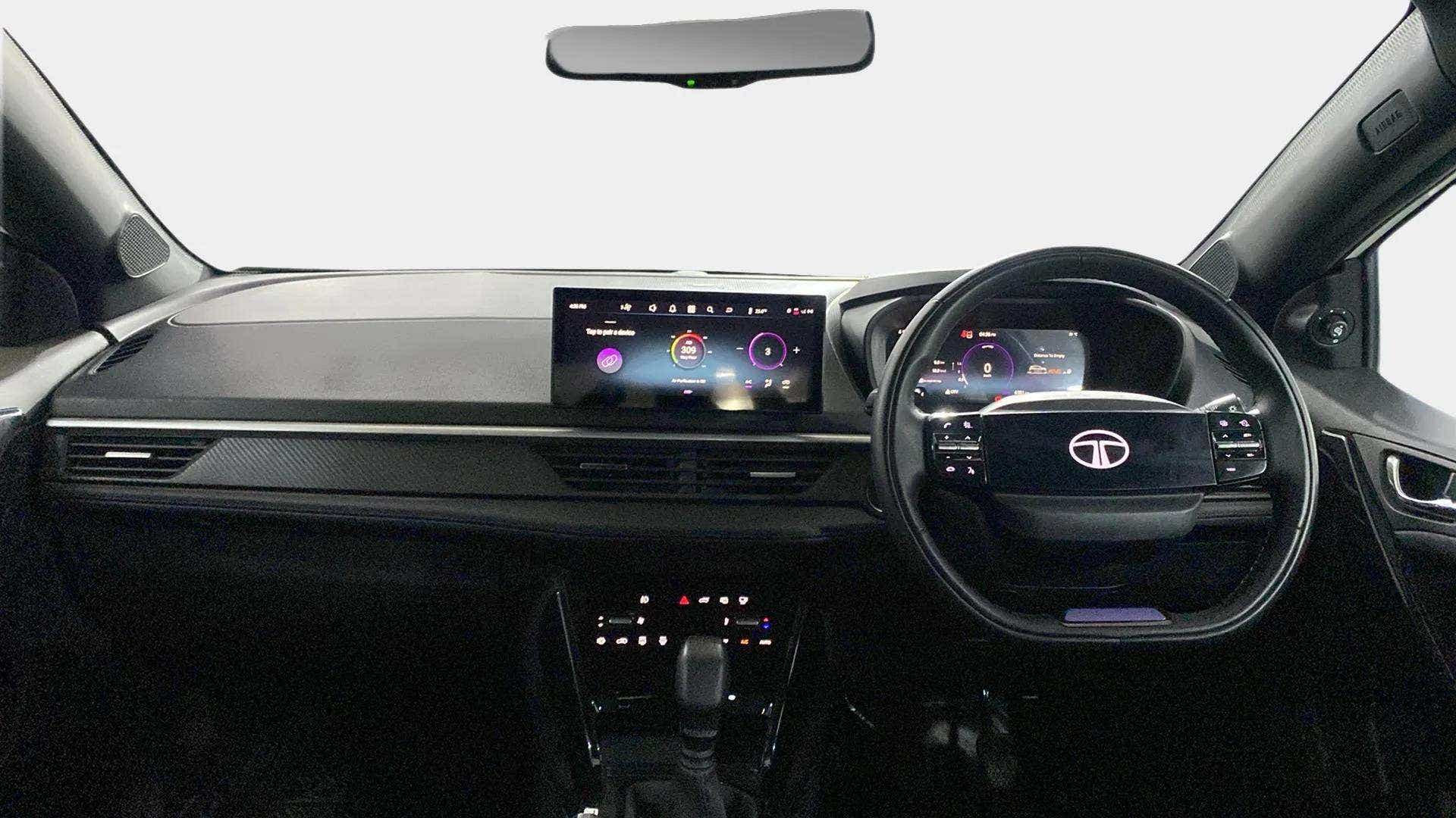 Dashboard and steering wheel view of a Tata Nexon 2017-2023