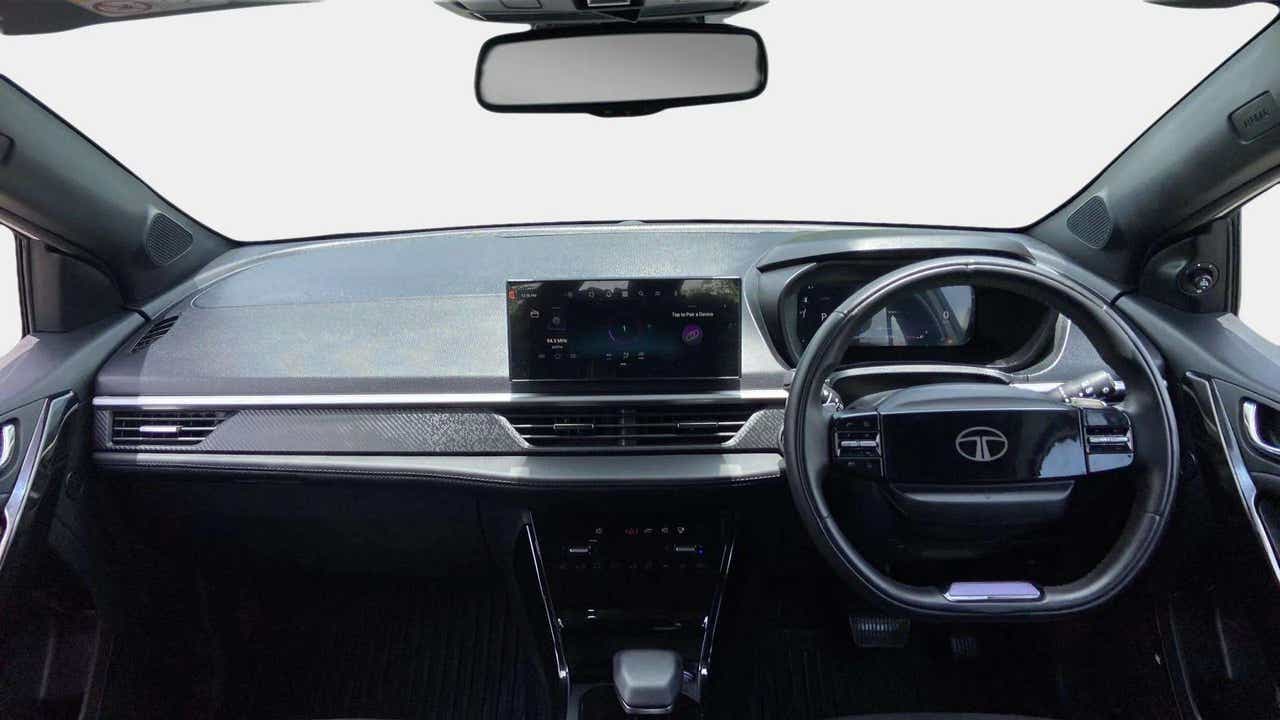 Dashboard and steering wheel view of a Tata Nexon