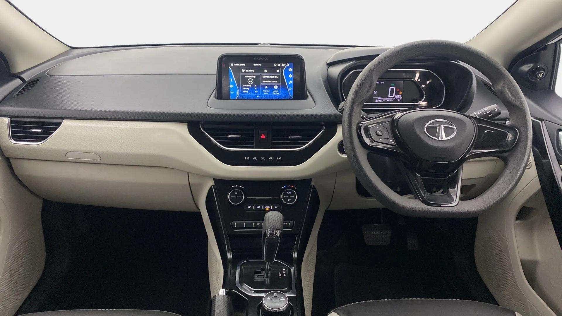 Dashboard and steering wheel view of a Tata Nexon 2017-2023
