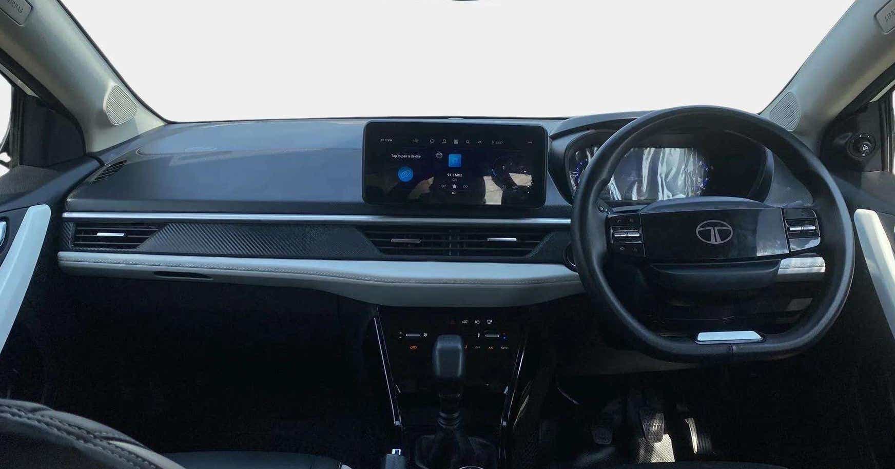 Dashboard and steering wheel of a Tata Nexon