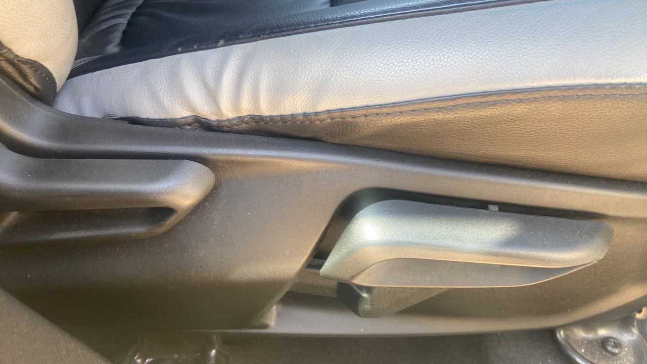 Close-up of the seat adjustment lever of a Tata Nexon 2017-2023