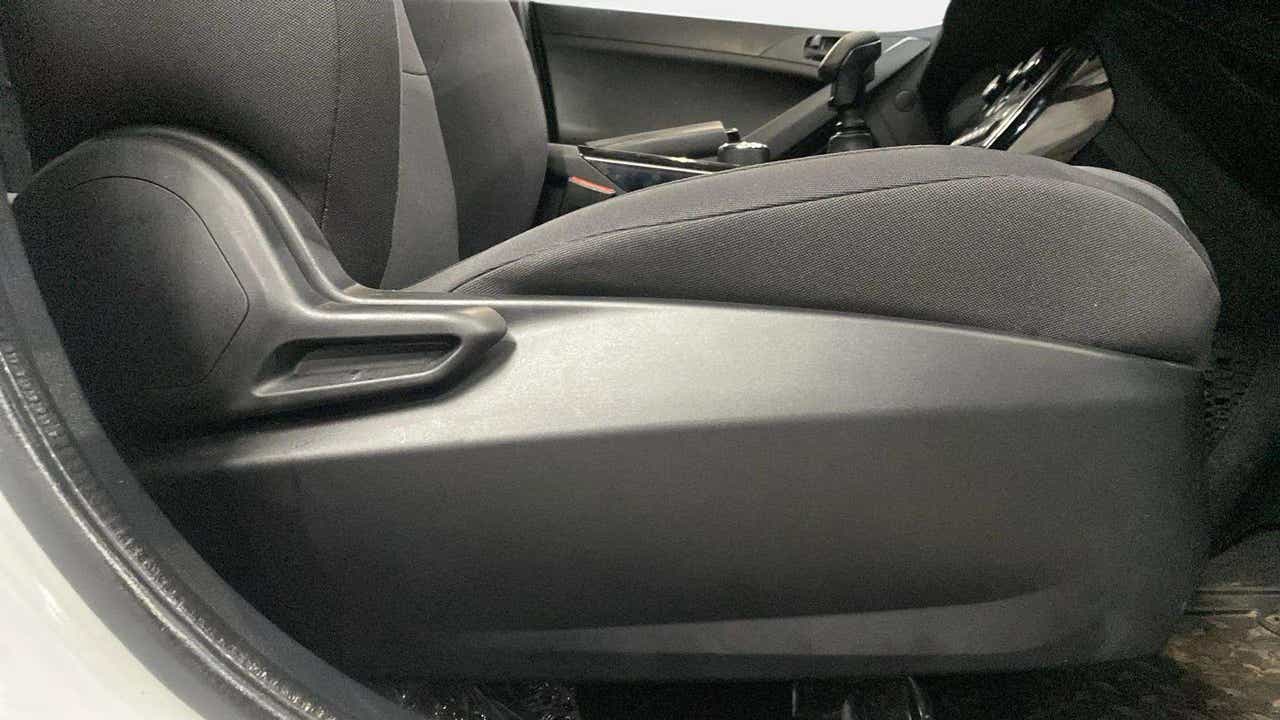 Front seat side view of a Tata Nexon