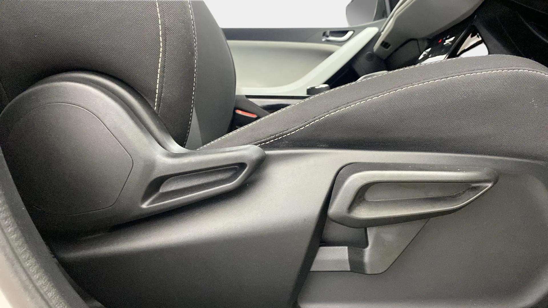 Close-up of seat adjustment lever of a Tata Nexon