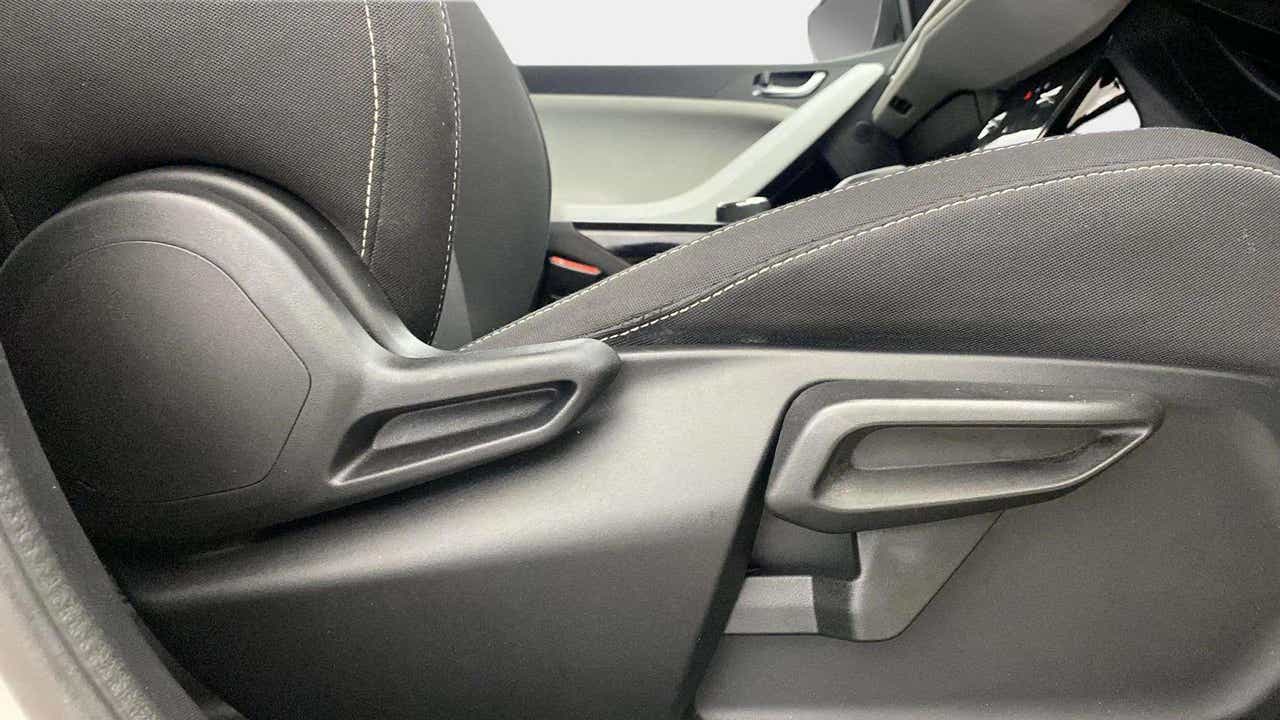 Close-up of seat adjustment lever of a Tata Nexon