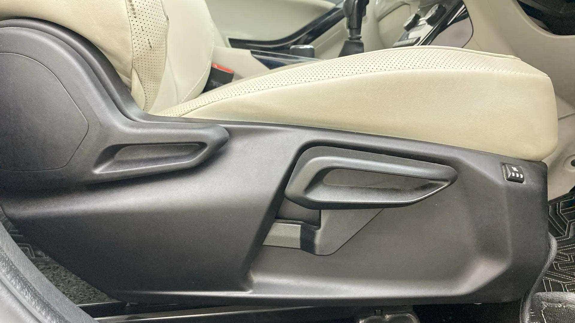 Front seat adjustment controls of a Tata Nexon 2017-2023