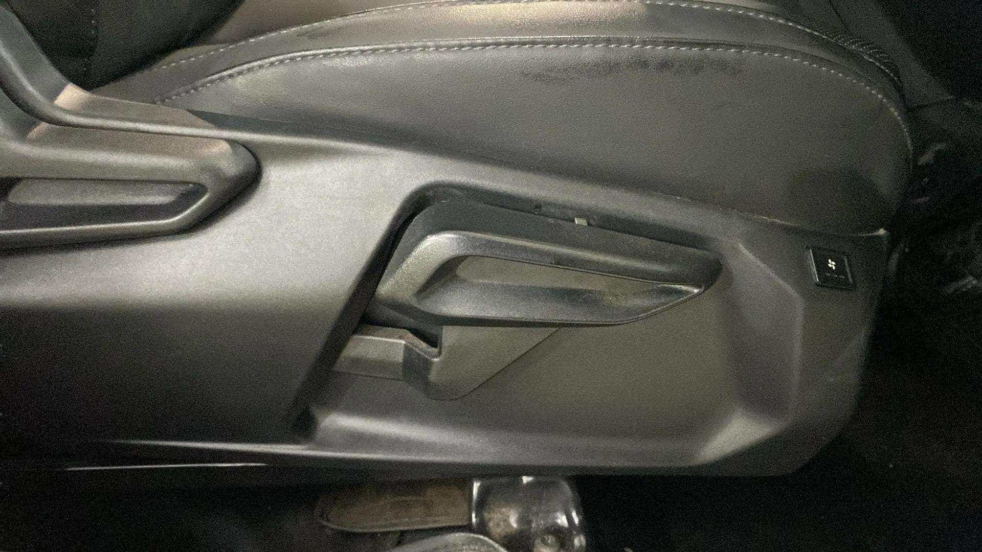 Seat adjustment control area of a Tata Nexon 2017-2023