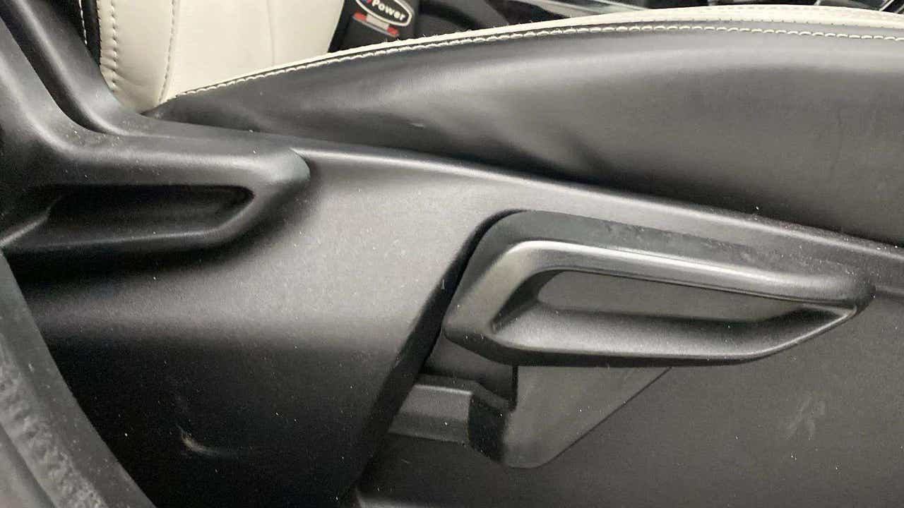 Interior door handle close-up of a Tata Nexon
