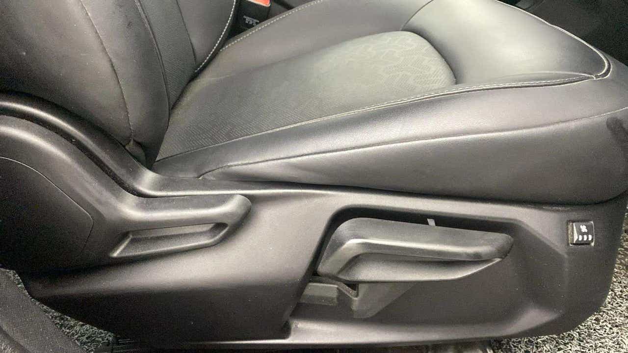 Close-up of seat adjustment controls of a Tata Nexon 2017-2023