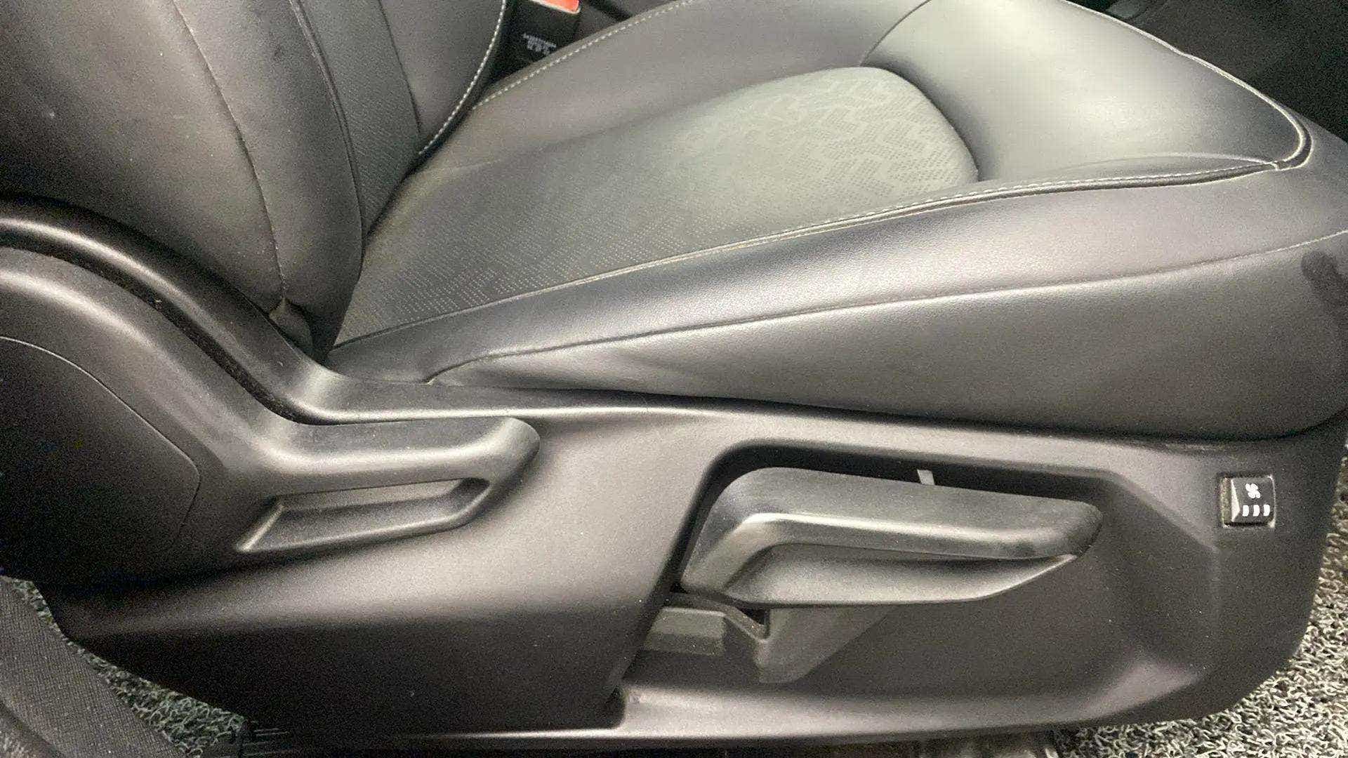 Close-up of seat adjustment controls of a Tata Nexon 2017-2023