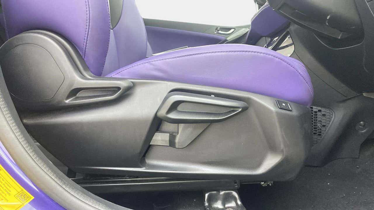 Side view of the front seat controls of a Tata Nexon