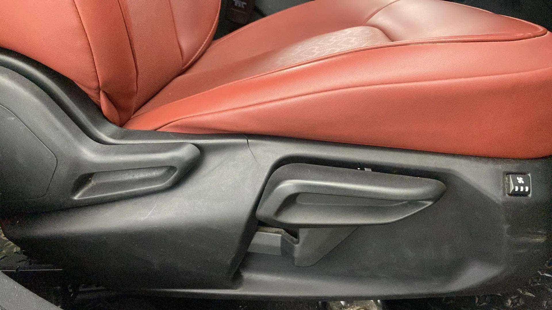 Front seat adjustment controls of a Tata Nexon 2017-2023