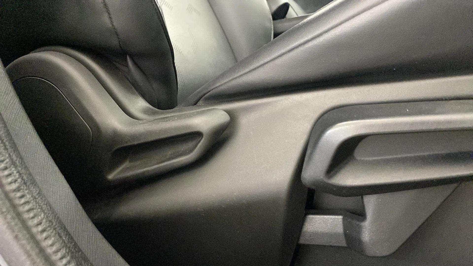 Close-up of interior seat controls of a Tata Nexon 2017-2023