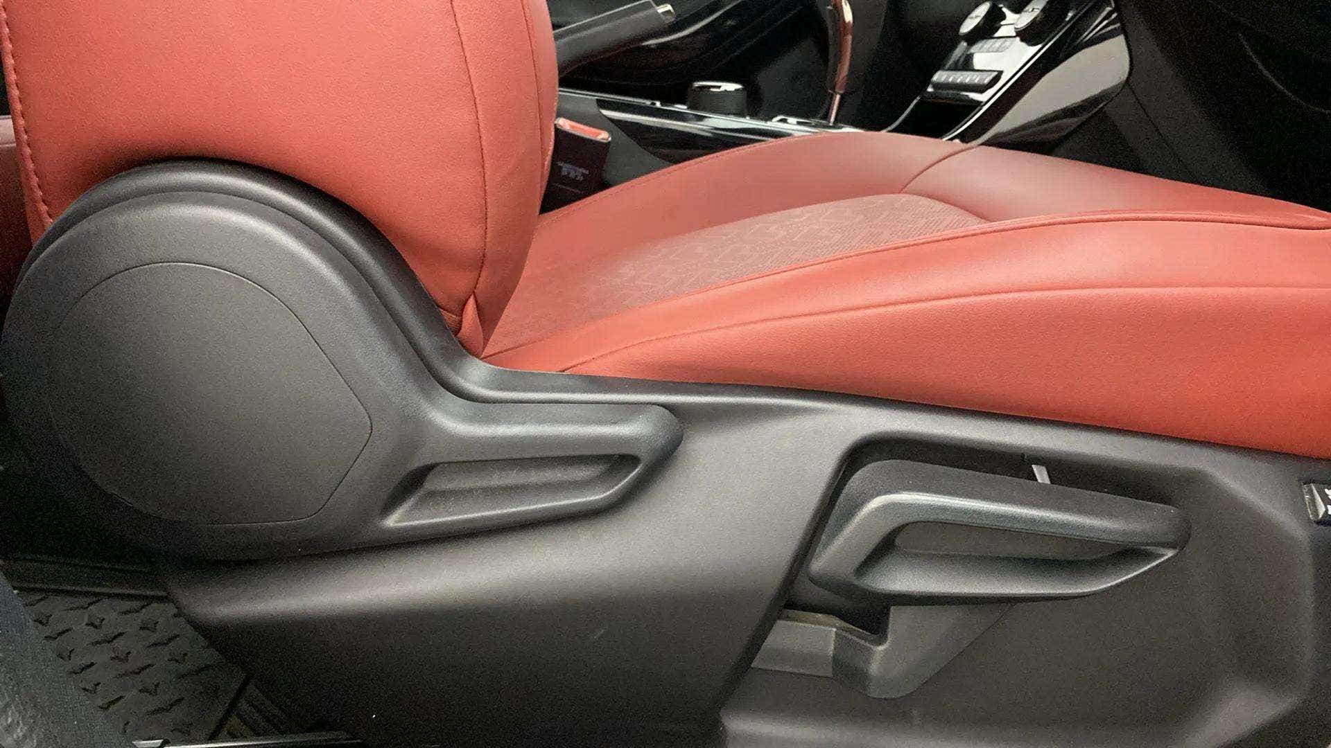 Front seat adjustment lever and side view of a Tata Nexon 2017-2023