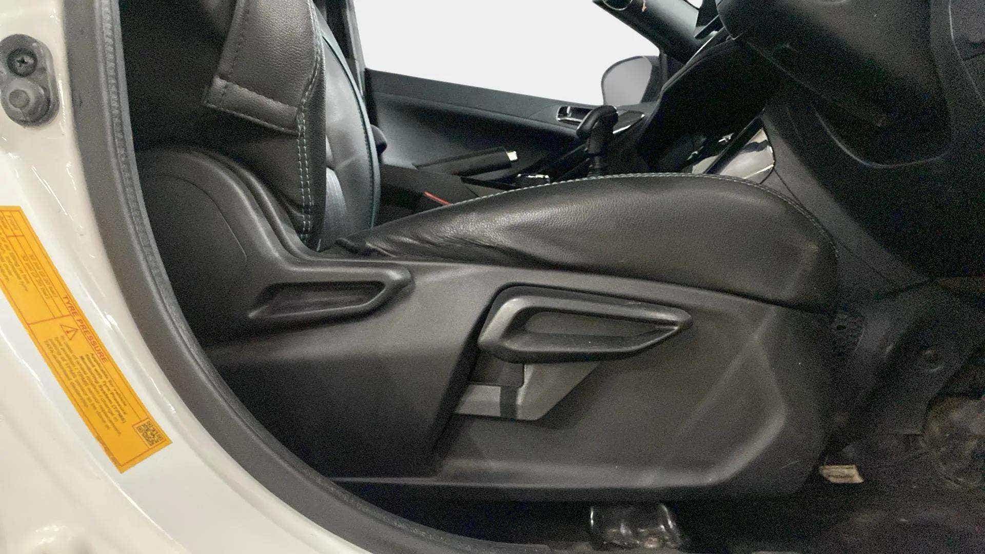 Driver seat side adjustment levers of a Tata Nexon 2017-2023