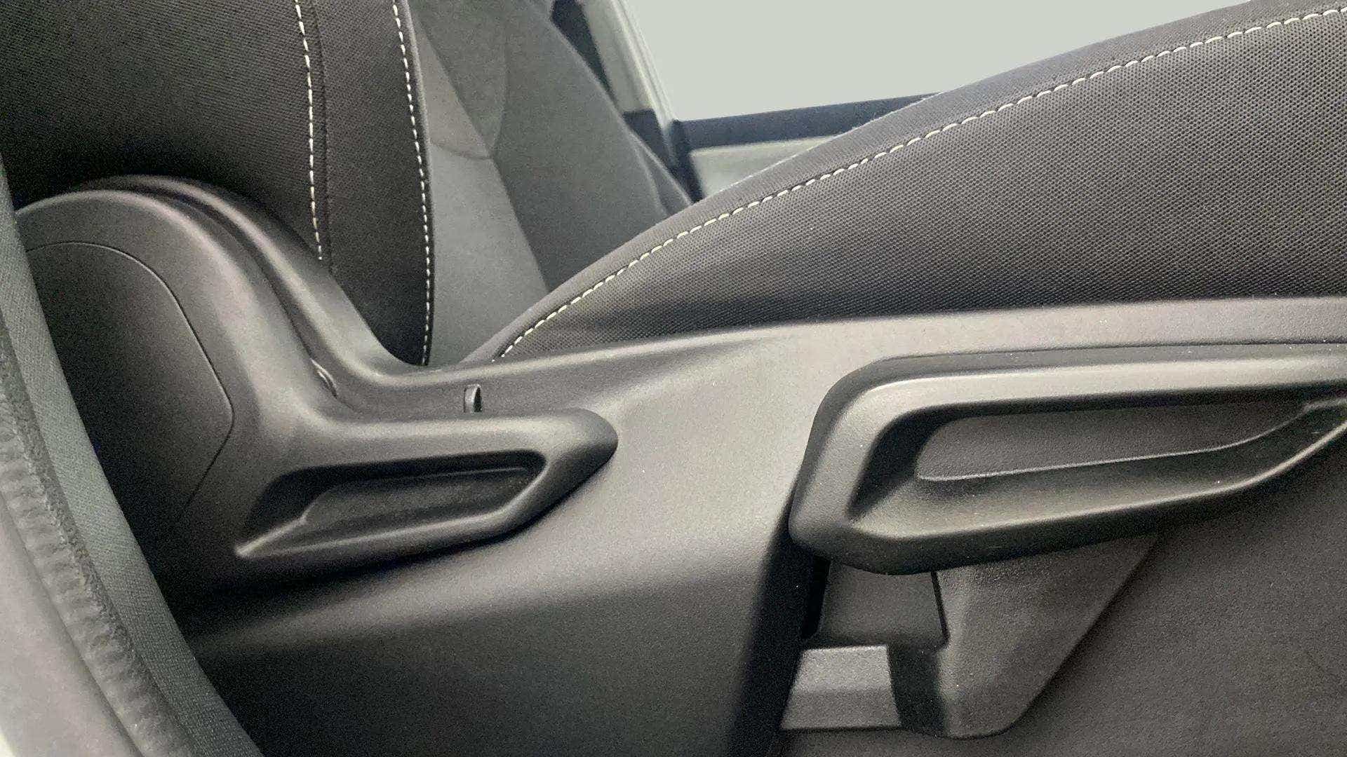 Seat adjustment handles of a Tata Nexon