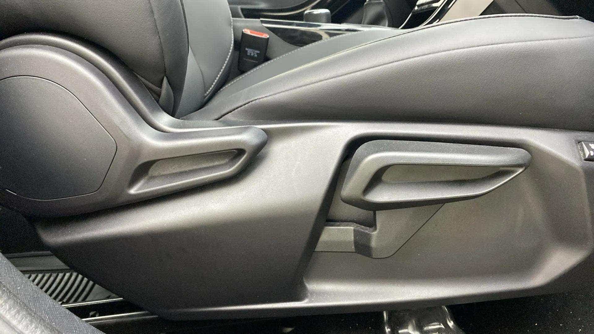 Side view of a Tata Nexon 2017-2023 seat adjustment lever