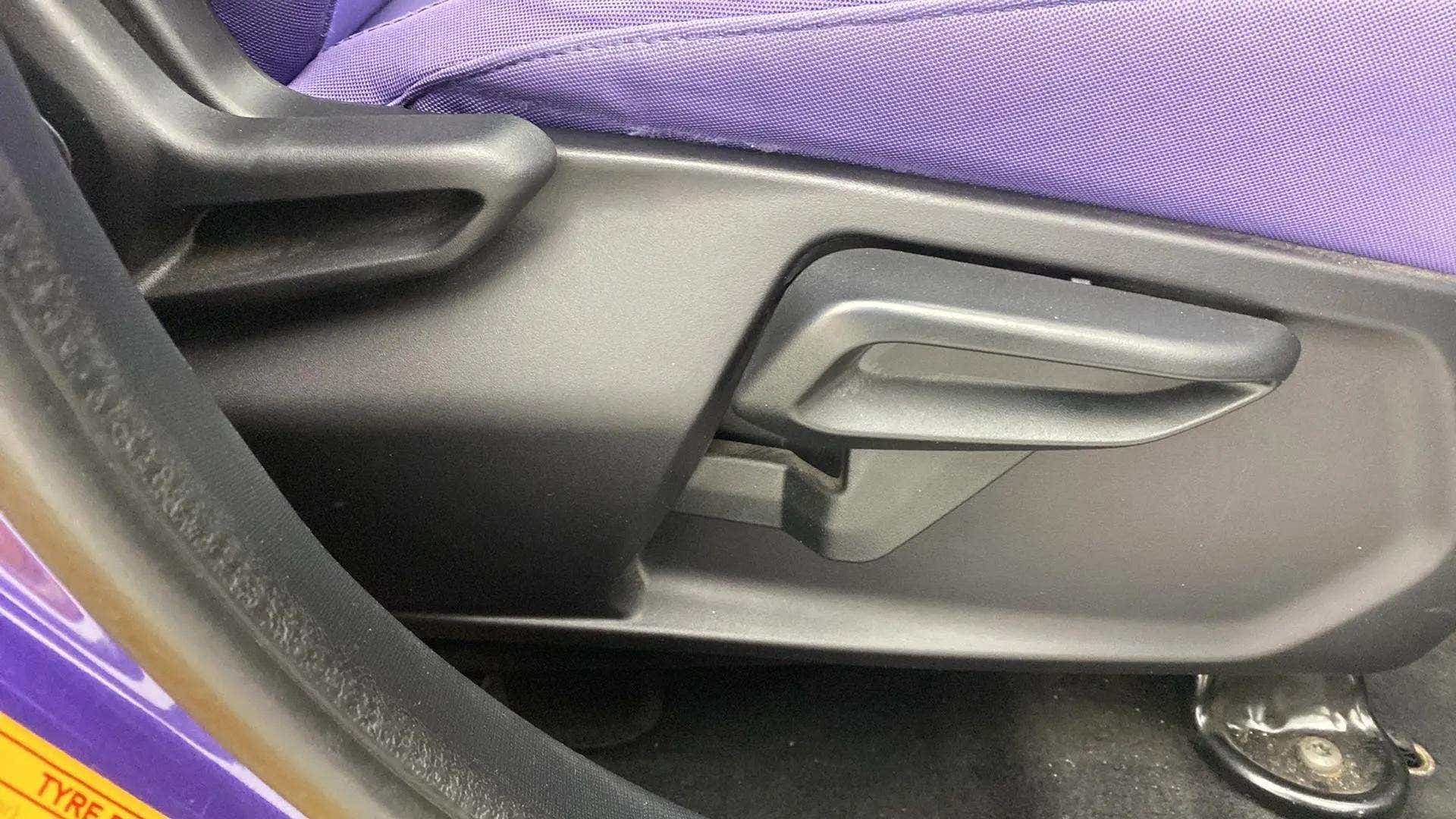 Seat adjustment lever area of a Tata Nexon 2017-2023