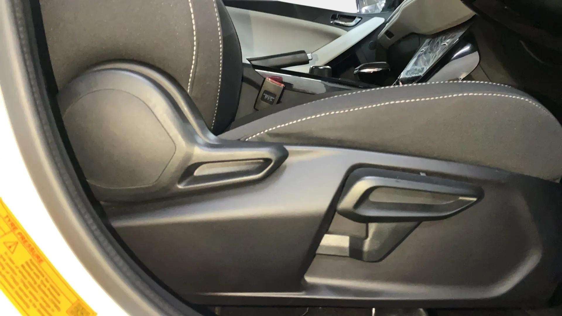 Front seat adjustment controls of a Tata Nexon