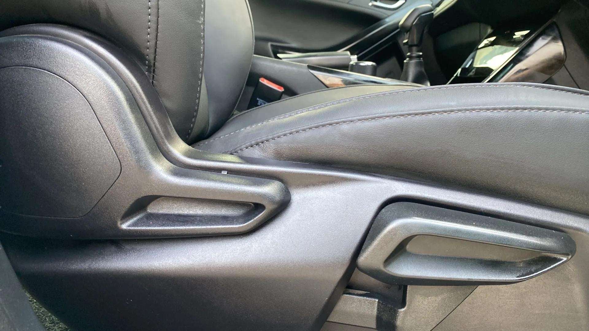 Close-up of seat adjustment controls of a Tata Nexon 2017-2023