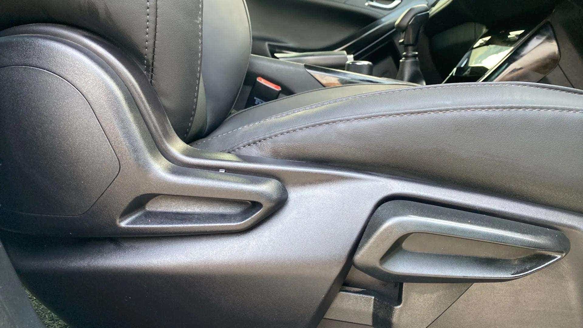 Close-up of seat adjustment controls of a Tata Nexon 2017-2023